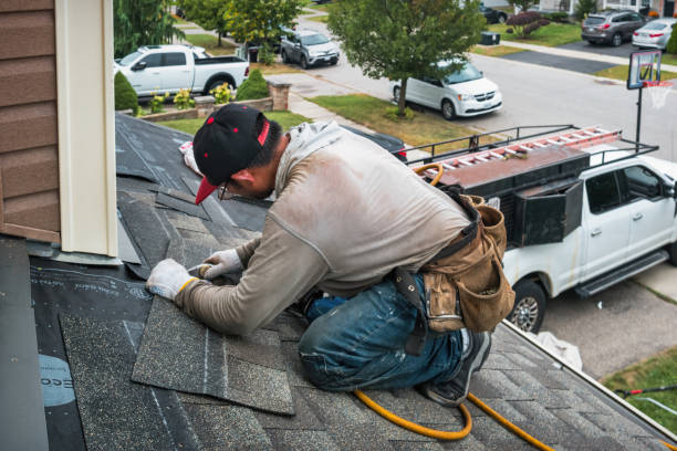 Professional Flat Roof Repair technician working in Creamery, PA